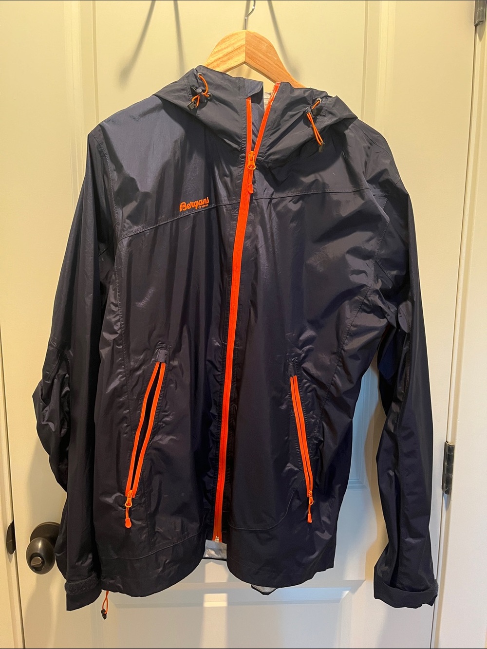 BERGANS of NORWAY Helium Ultralight waterproof hooded jacket. Navy w/orange trim